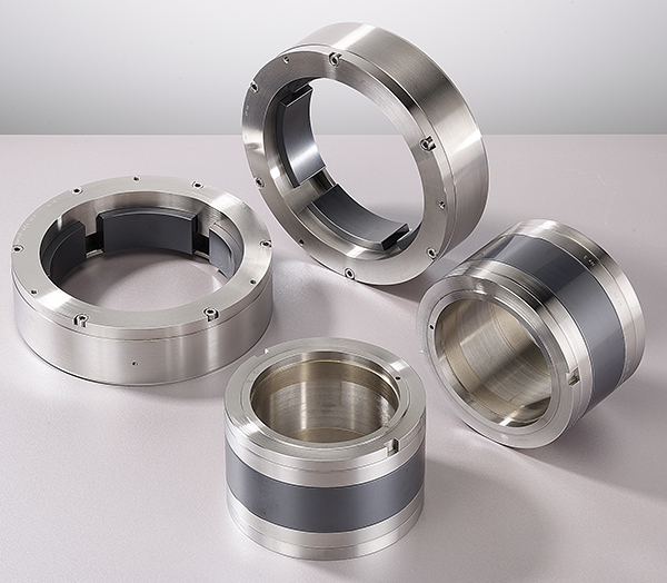 Ceramic bearing materials for water injection pump journal bearings