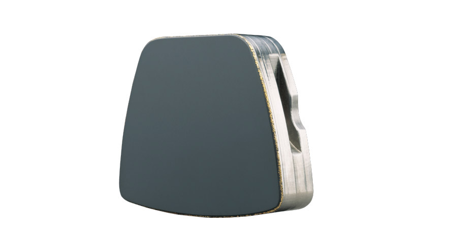 Polymer bearing surface for large tilt pad thrust bearing